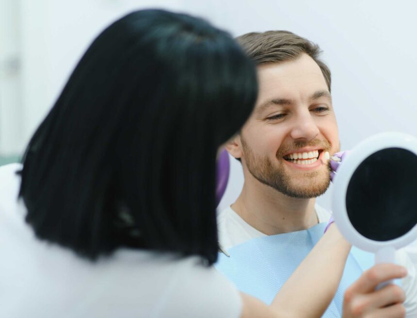 dental-care-concept-handsome-young-guy-at-the-den-2 smile makeover in turkey hero